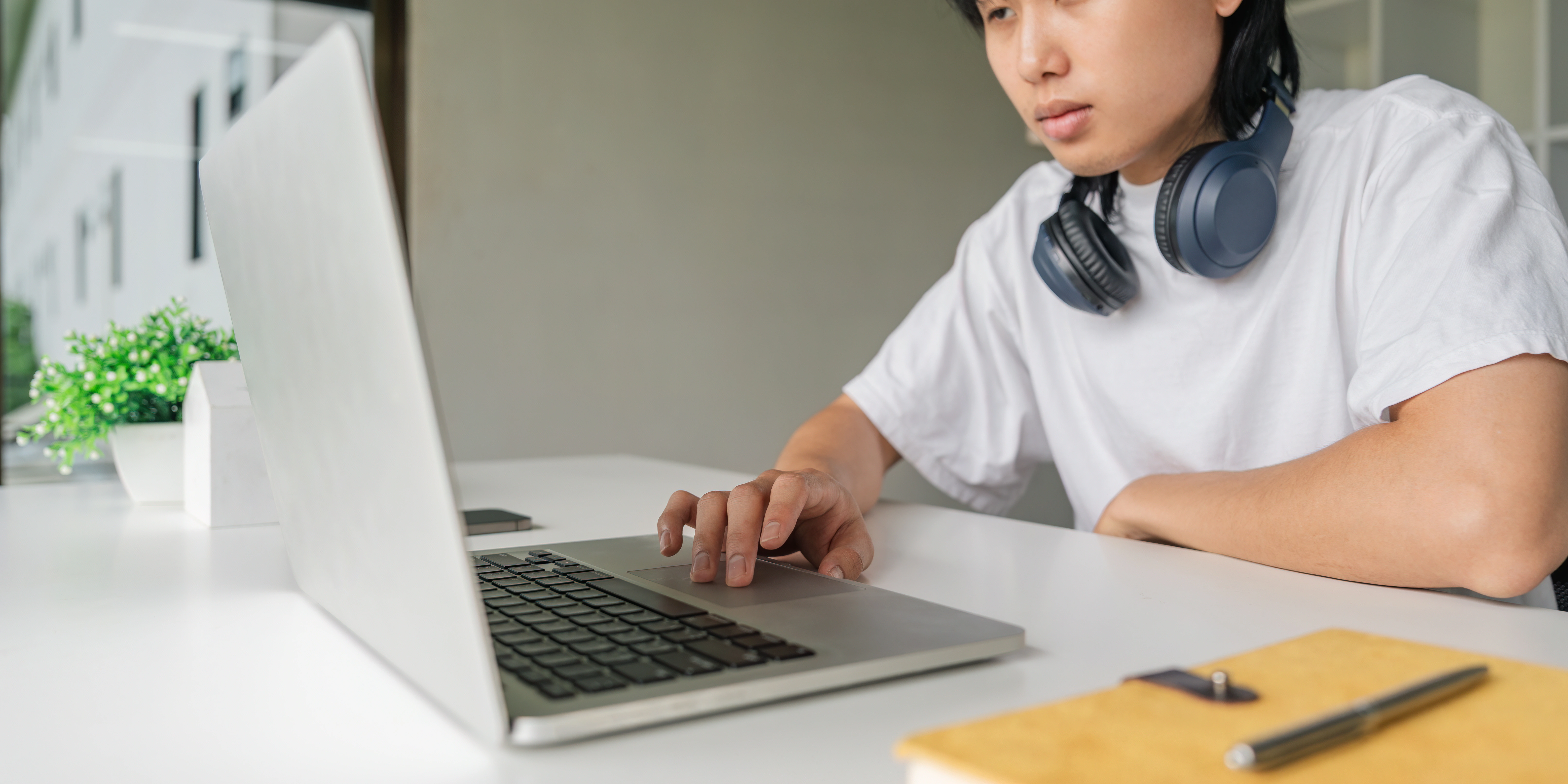 Student focused on learning with a laptop